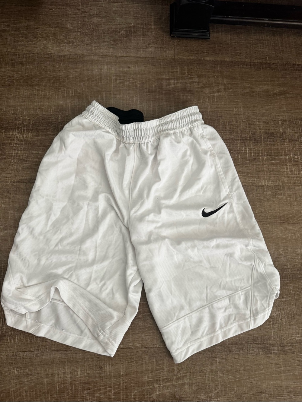 Nike White Athletic Shorts with Black Trim and Swoosh